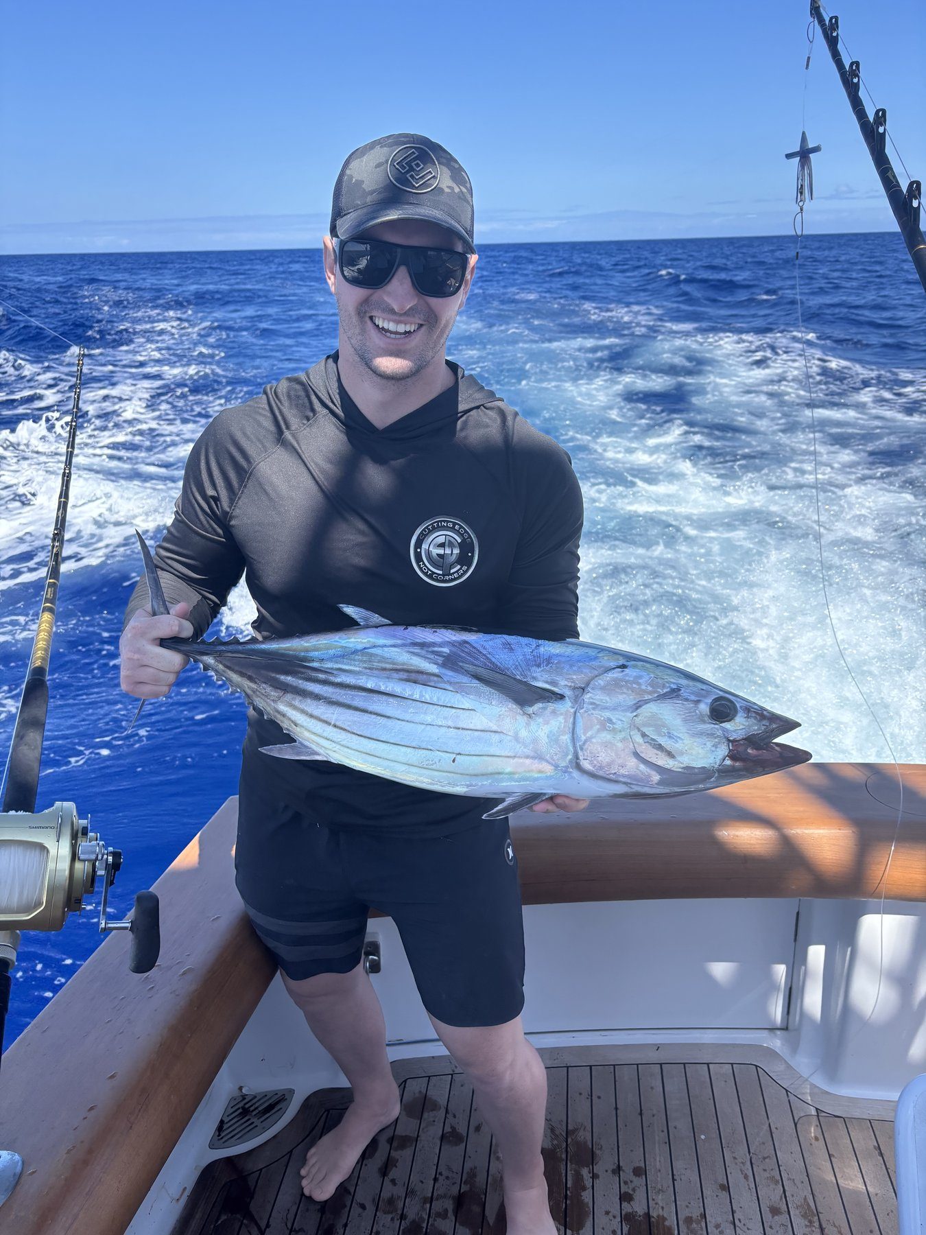 Angler with skipjack tuna